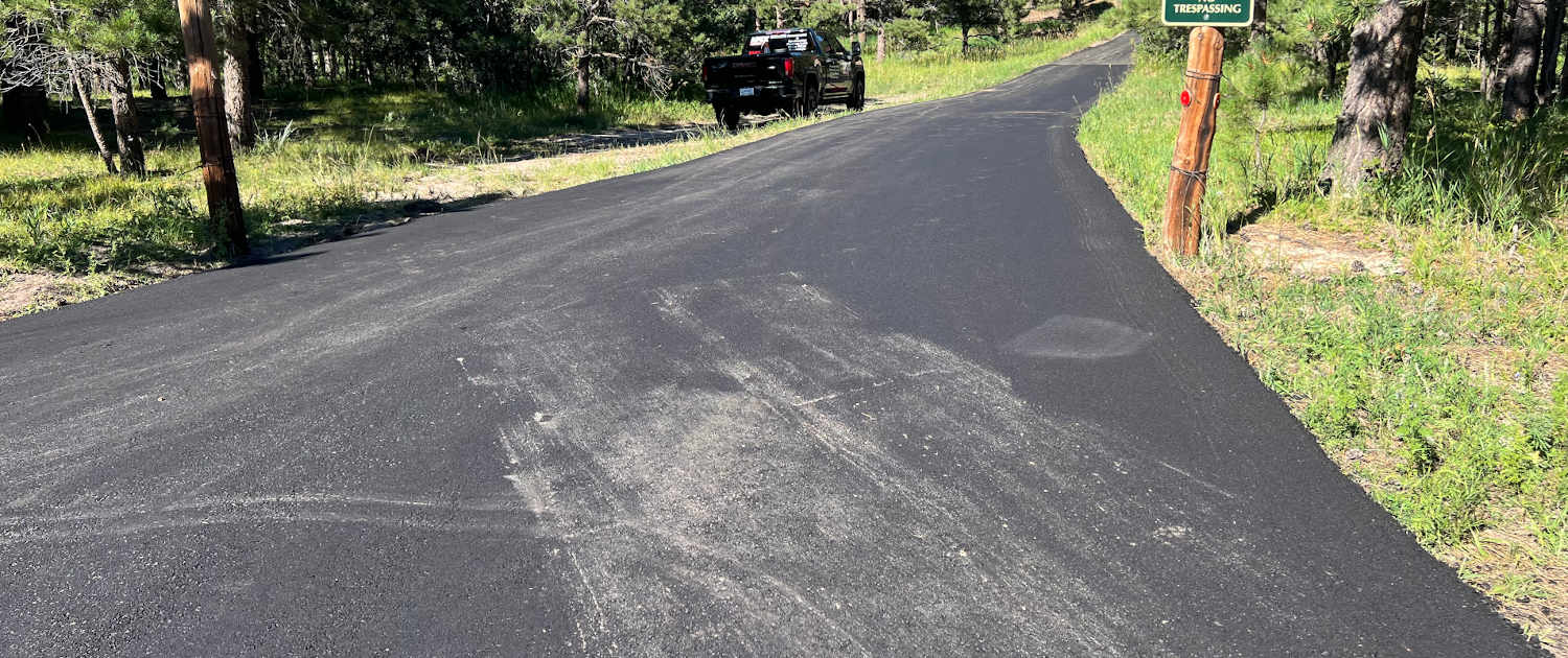 new asphalt driveway installed